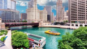 boat tour on river with chicago skyline in background